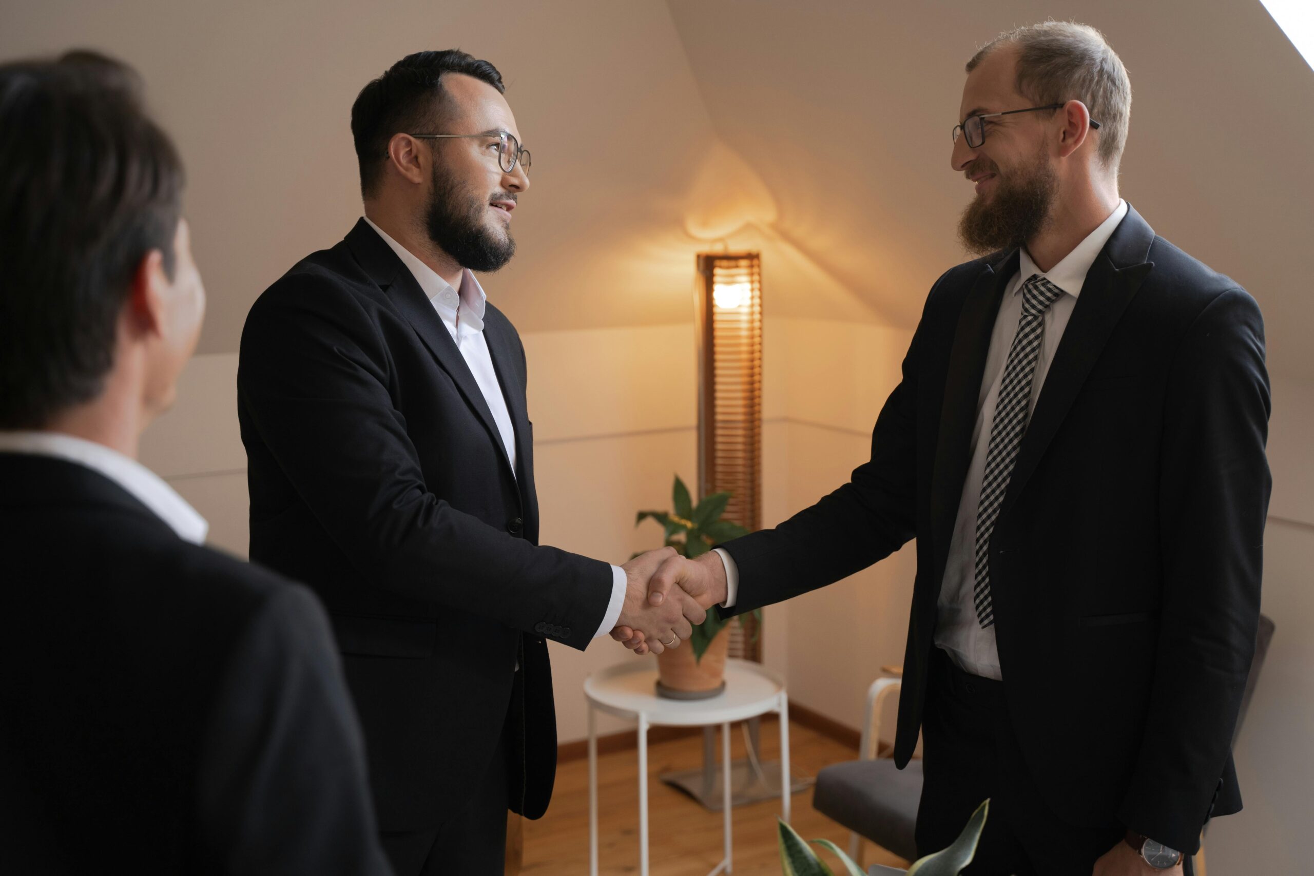 two business people closing a deal